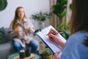 a woman during Therapy session Psychologist consultations in CBT therapy, consultant psychologist, consult a psychologist online