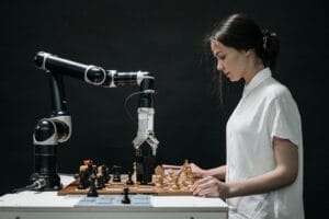 A woman playing Chess with a robot, NLP Powers